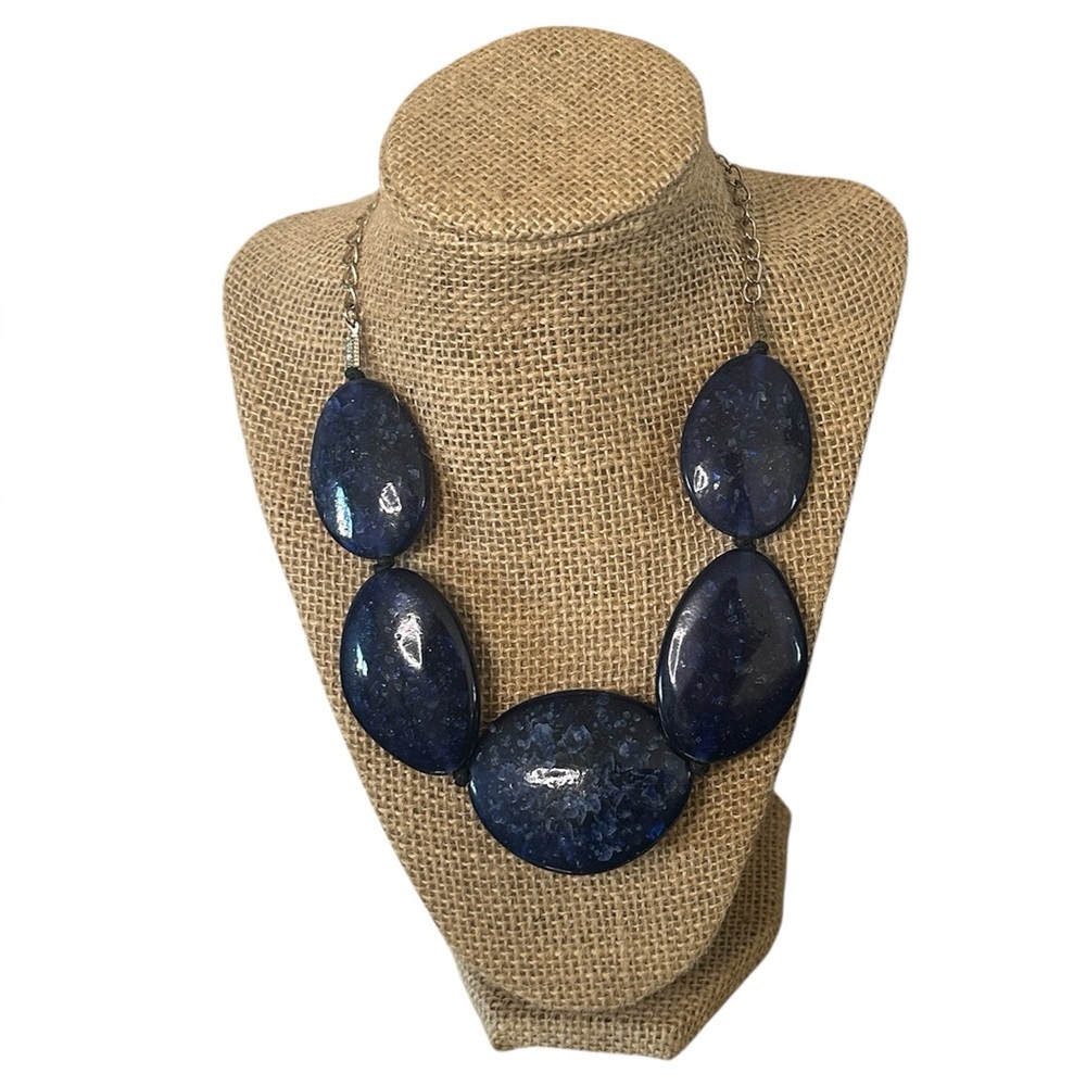 Charming Charlie gold-tone necklace with blue stones.